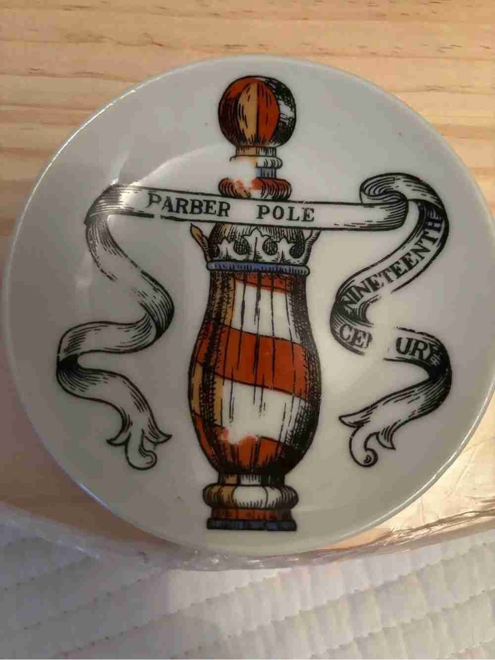 Ceramic Wall Plate with Orange and White Barber Pole Illustration